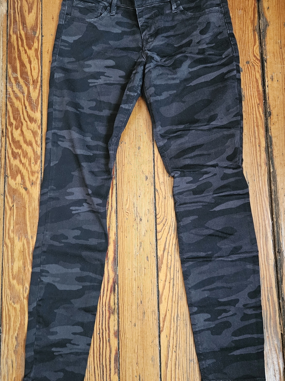 Express Women’s Black Camo Skinny Jeans.